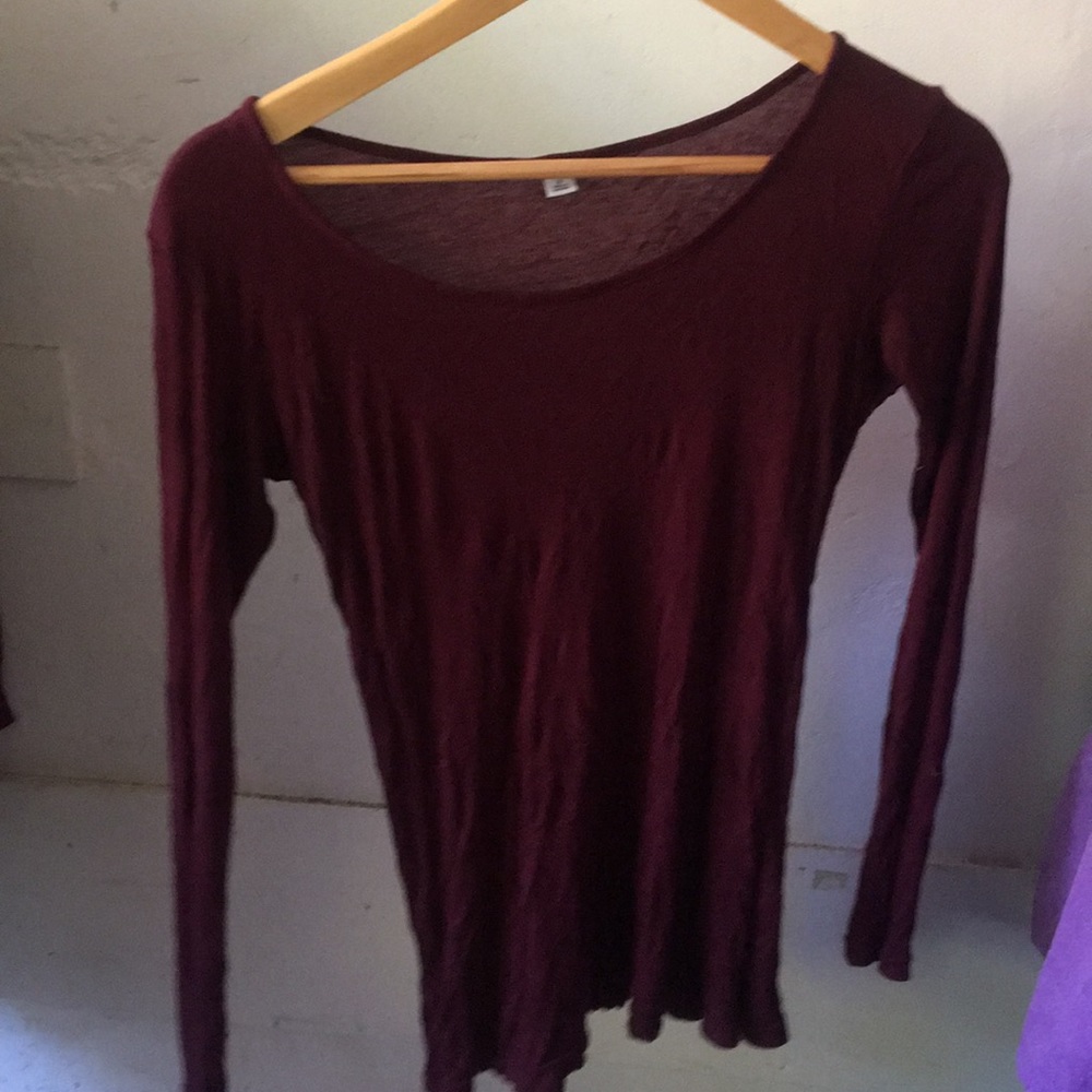 Long sleeve burgundy shirt.